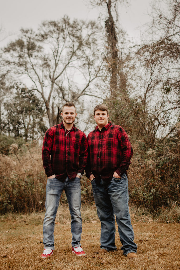 brothers posing during family photos